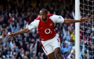 thierry henry of arsenal celebrates